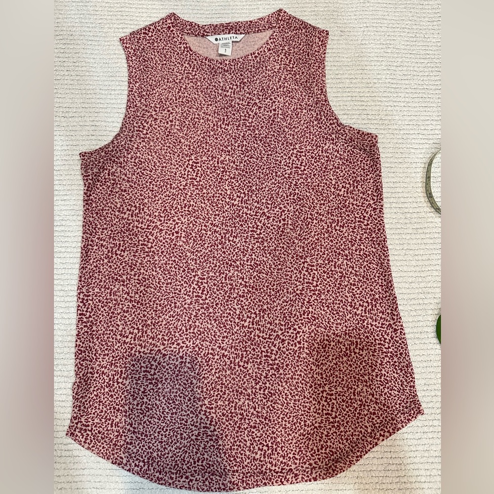 Athleta sleeveless pink/ ivory leopard top. Size Small. Slits on hem. EUC